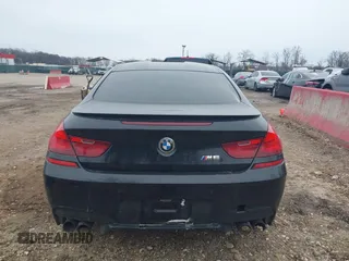 2014 BMW M6 z VIN WBSLX9C58ED160558, wystawiony jako IAAI lot #41553209 z przebiegiem 154 789 mil mil oraz . Historia ofert i sprzedaży dostępna na DreamBid. Obrazek 17.