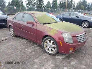 2003 Cadillac CTS with VIN 1G6DM57N430169806, listed as a IAAI auction lot 40306394 with 226,958 mi miles. Bid and sale history available at carsss.com. Image 1.