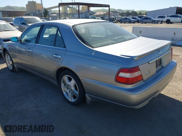 1999 Infiniti Q45 z VIN JNKBY31A8XM603290, wystawiony jako IAAI lot #41668113 z przebiegiem 144 251 mil mil oraz . Historia ofert i sprzedaży dostępna na DreamBid. Obrazek 3.