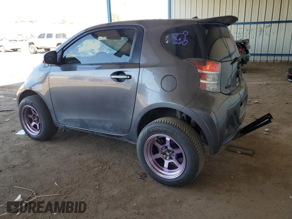 2012 Scion iQ z VIN JTNJJXB09CJ012794, wystawiony jako Copart lot #52983435 z przebiegiem 135 927 mil mil oraz Szkoda całkowita • Salvage title. Historia ofert i sprzedaży dostępna na DreamBid. Obrazek 2.