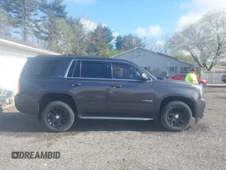 2016 GMC Yukon SLE with VIN 1GKS2AKC9GR273724, listed as a IAAI auction lot 41945761 with 141,425 mi miles. Bid and sale history available at carsss.com. Image 14.