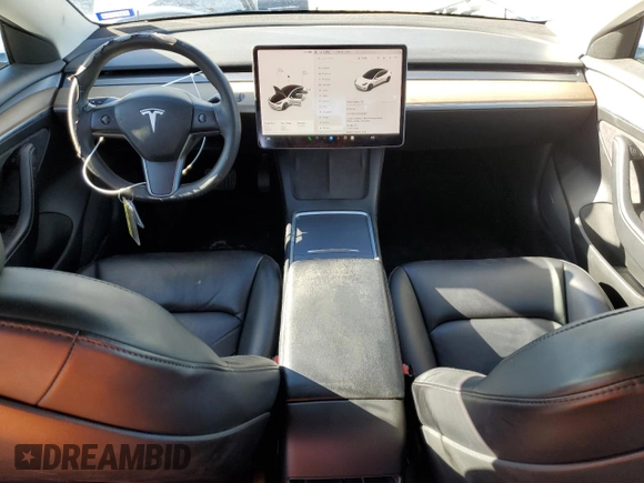 2021 Tesla Model 3 Standard Range Plus with VIN 5YJ3E1EA7MF089997, listed as a Copart auction lot 81528284 with 147,242 mi miles and Clean Title. Bid and sale history available at DreamBid. Image 8.