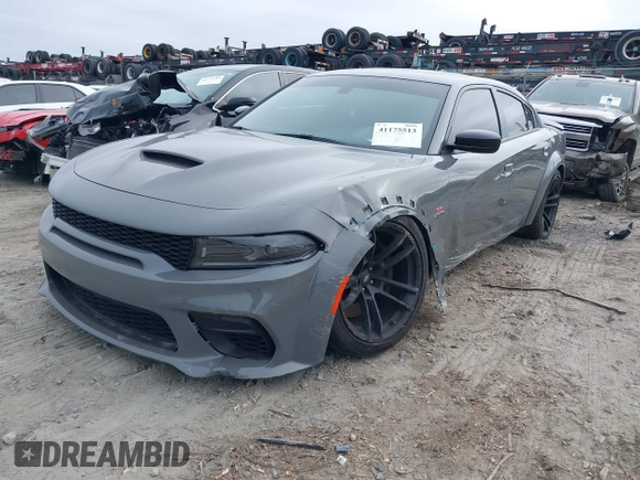 2023 Dodge Charger Scat Pack Widebody with VIN 2C3CDXGJ6PH646050, listed as a IAAI auction lot 41175513 with 7,684 mi miles and . Bid and sale history available at DreamBid. Image 2.