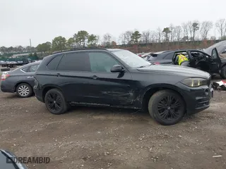 2015 BMW X5 xDrive35i with VIN 5UXKR0C54F0P00889, listed as a IAAI auction lot 42023099 with 196,387 mi miles. Bid and sale history available at carsss.com. Image 13.