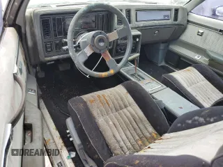1986 Buick Regal with VIN 1G4GK4775GP227474, listed as a Copart auction lot 77446764 with 43,120 mi miles and Salvage Title. Bid and sale history available at DreamBid. Image 8.