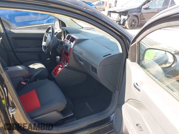 2009 Dodge Caliber R/T z VIN 1B3HB78B79D111647, wystawiony jako IAAI lot #42115580 z przebiegiem 54 451 mil mil oraz . Historia ofert i sprzedaży dostępna na DreamBid. Obrazek 5.