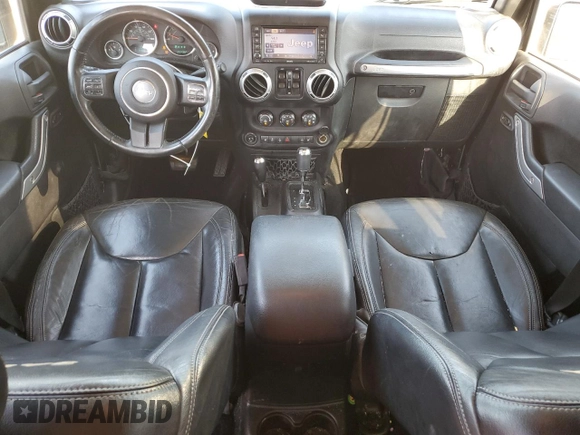 2015 Jeep Wrangler Unlimited Sahara with VIN 1C4HJWEGXFL744852, listed as a Copart auction lot 60246145 with 135,496 mi miles and Salvage title. Bid and sale history available at DreamBid. Image 8.