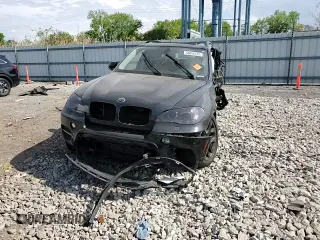 2012 BMW X5 35i with VIN 5UXZV4C54CL985119, listed as a Copart auction lot 56856735 with Not provided miles and Salvage title. Bid and sale history available at DreamBid. Image 14.