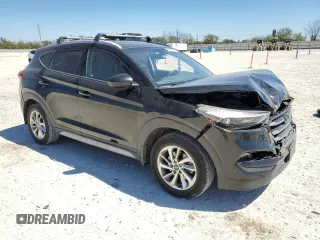 2017 Hyundai Tucson SE with VIN KM8J33A40HU409713, listed as a Copart auction lot 50105805 with 100,463 mi miles and Salvage Title. Bid and sale history available at DreamBid. Image 4.