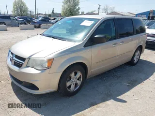 2013 Dodge Grand Caravan SE with VIN 2C4RDGBG9DR642162, listed as a IAAI auction lot 42113378 with 182,370 mi miles and . Bid and sale history available at DreamBid. Image 2.