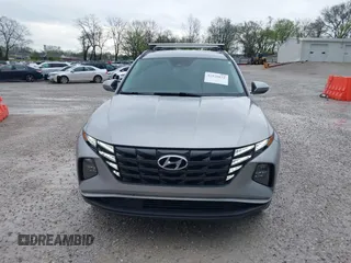 2022 Hyundai Tucson Blue z VIN KM8JBCA13NU077934, wystawiony jako IAAI lot #41920832 z przebiegiem 59 579 mil mil oraz . Historia ofert i sprzedaży dostępna na DreamBid. Obrazek 12.