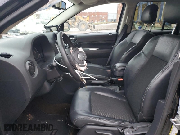 2016 Jeep Compass Latitude with VIN 1C4NJCEB7GD664653, listed as a Copart auction lot 87313664 with 64,580 mi miles and Salvage Title. Bid and sale history available at carsss.com. Image 7.