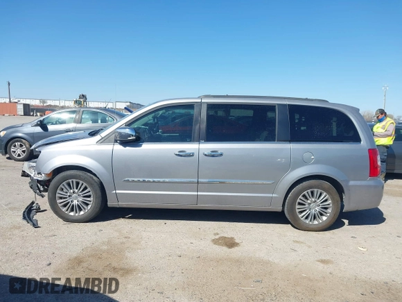 2014 Chrysler Town & Country Touring-L with VIN 2C4RC1CG7ER234517, listed as a IAAI auction lot 41824484 with 190,245 mi miles. Bid and sale history available at carsss.com. Image 15.