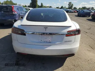 2019 Tesla Model S 100D with VIN 5YJSA1E41KF330631, listed as a Copart auction lot 55360295 with 52,245 mi miles and Salvage title. Bid and sale history available at DreamBid. Image 6.