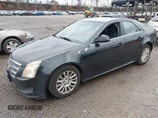 2011 Cadillac CTS z VIN 1G6DC5EY3B0107442, wystawiony jako IAAI lot #41918364 z przebiegiem 255 238 mil mil oraz . Historia ofert i sprzedaży dostępna na DreamBid. Obrazek 2.