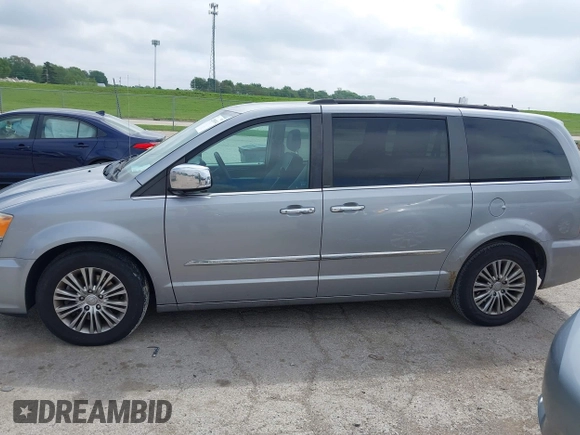 2014 Chrysler Town & Country Touring-L with VIN 2C4RC1CG2ER107917, listed as a IAAI auction lot 42180194 with 169,447 mi miles. Bid and sale history available at carsss.com. Image 14.