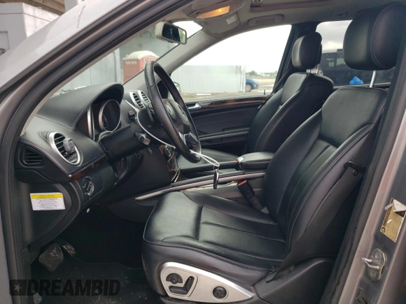 2012 Mercedes-Benz GL-Class GL 450 with VIN 4JGBF7BE6CA784588, listed as a Copart auction lot 74223144 with 293,636 mi miles and Salvage Title. Bid and sale history available at carsss.com. Image 7.