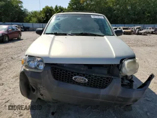 2006 Ford Escape XLT with VIN 1FMCU03116KA69312, listed as a Copart auction lot 70773514 with 164,079 mi miles and Salvage Title. Bid and sale history available at carsss.com. Image 5.