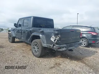 2022 Jeep Gladiator Texas Trail with VIN 1C6HJTAG7NL125006, listed as a IAAI auction lot 42288180 with 96,694 mi miles and . Bid and sale history available at DreamBid. Image 3.