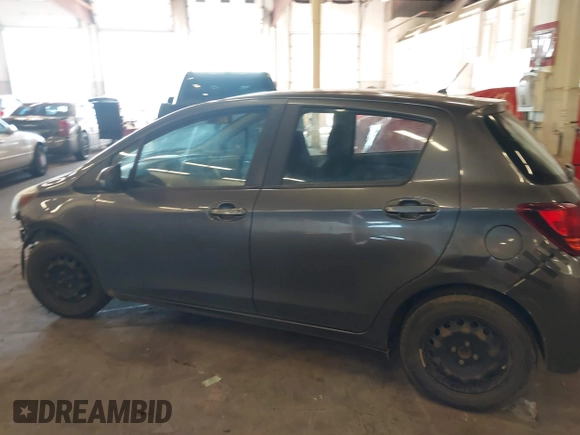 2015 Toyota Yaris L with VIN VNKKTUD36FA049550, listed as a IAAI auction lot 41671226 with 129,540 mi miles. Bid and sale history available at carsss.com. Image 14.