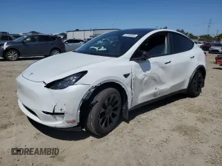 2023 Tesla Model Y Long Range z VIN 7SAYGDEE2PA061792, wystawiony jako Copart lot #52106965 z przebiegiem 11 968 mil mil oraz Szkoda całkowita • Salvage title. Historia ofert i sprzedaży dostępna na DreamBid. Obrazek 1.