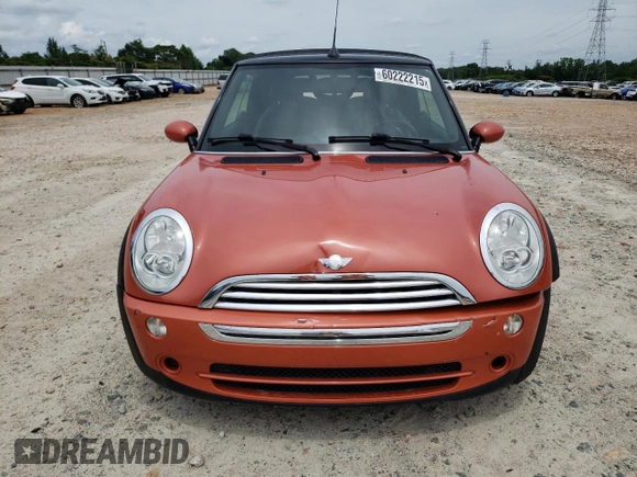 2006 MINI Convertible with VIN WMWRF335X6TF64910, listed as a Copart auction lot 60222215 with 85,761 mi miles and Salvage title. Bid and sale history available at DreamBid. Image 5.