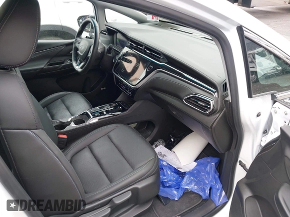 2023 Chevrolet Bolt EV 2LT z VIN 1G1FX6S07P4198027, wystawiony jako IAAI lot #42453916 z przebiegiem 5 133 mil mil oraz . Historia ofert i sprzedaży dostępna na DreamBid. Obrazek 5.