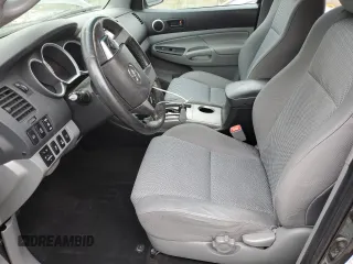 2014 Toyota Tacoma with VIN 3TMLU4EN7EM146056, listed as a Copart auction lot 54554255 with 116,035 mi miles and Salvage Title. Bid and sale history available at DreamBid. Image 7.