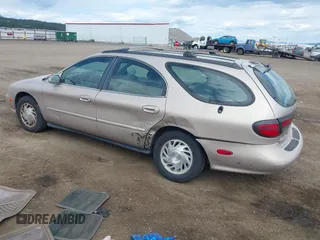 1998 Ford Taurus with VIN 1FAFP57U8WG275844, listed as a IAAI auction lot 42426107 with 318,654 mi miles and . Bid and sale history available at DreamBid. Image 3.
