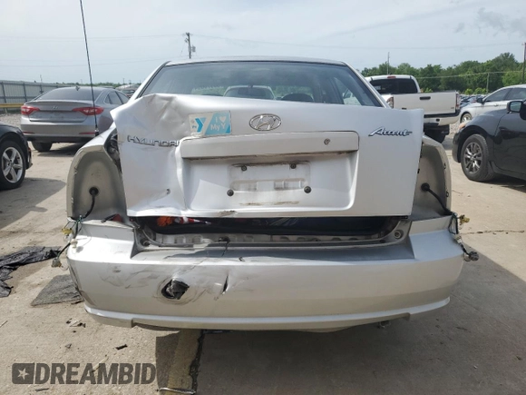 2004 Hyundai Accent GL with VIN KMHCG45C64U524377, listed as a Copart auction lot 53976094 with 65,230 mi miles and Non Repairable. Bid and sale history available at carsss.com. Image 6.