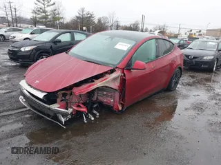 2024 Tesla Model Y Long Range with VIN 7SAYGAEE7RF133073, listed as a IAAI auction lot 41081463 with Not Provided miles and . Bid and sale history available at DreamBid. Image 2.