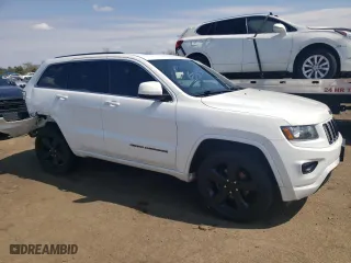 2015 Jeep Grand Cherokee Altitude with VIN 1C4RJFAG0FC725933, listed as a Copart auction lot 52714805 with 119,550 mi miles and Salvage Title. Bid and sale history available at carsss.com. Image 4.