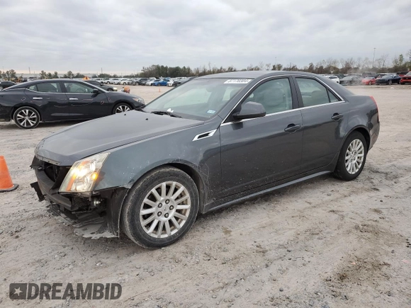 2012 Cadillac CTS with VIN 1G6DA5E53C0139952, listed as a Copart auction lot 87170304 with 102,915 mi miles and Salvage title. Bid and sale history available at DreamBid. Image 1.