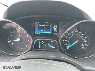 2016 Ford Escape SE with VIN 1FMCU9G97GUB49000, listed as a IAAI auction lot 41797005 with 104,690 mi miles. Bid and sale history available at carsss.com. Image 7.