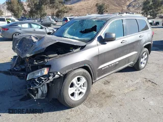 2017 Jeep Grand Cherokee Laredo with VIN 1C4RJEAG8HC944037, listed as a IAAI auction lot 41299619 with 140,405 mi miles. Bid and sale history available at carsss.com. Image 17.