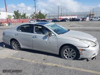 2004 Lexus ES 330 with VIN JTHBA30G240010487, listed as a IAAI auction lot 41627116 with 148,748 mi miles. Bid and sale history available at carsss.com. Image 13.