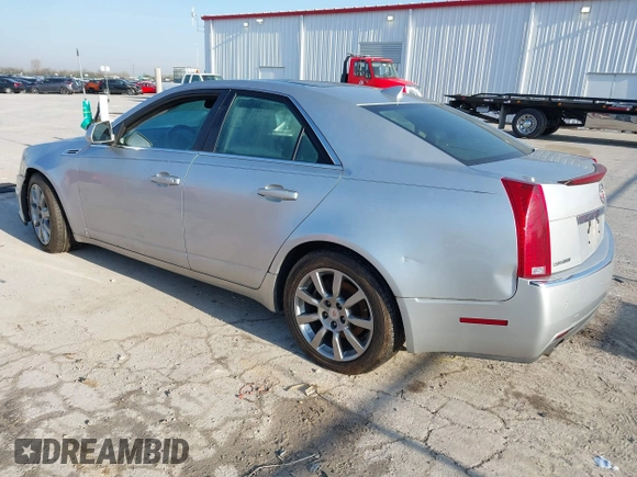 2009 Cadillac CTS RWD with VIN 1G6DV57V590125951, listed as a IAAI auction lot 42005788 with 160,133 mi miles and . Bid and sale history available at carsss.com. Image 3.
