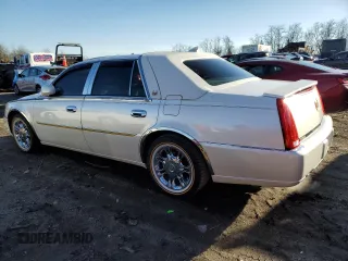 2011 Cadillac DTS z VIN 1G6KA5E6XBU109774, wystawiony jako Copart lot #45548595 z przebiegiem 90 356 mil mil oraz Szkoda całkowita • Salvage title. Historia ofert i sprzedaży dostępna na DreamBid. Obrazek 2.
