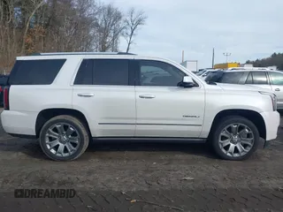 2016 GMC Yukon Denali with VIN 1GKS2CKJ9GR334645, listed as a IAAI auction lot 41781040 with 141,405 mi miles. Bid and sale history available at carsss.com. Image 13.