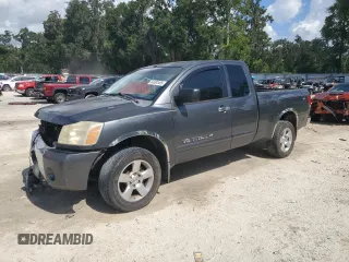 2006 Nissan Titan SE with VIN 1N6BA06BX6N572135, listed as a Copart auction lot 64582405 with 301,992 mi miles and Salvage title. Bid and sale history available at DreamBid. Image 1.