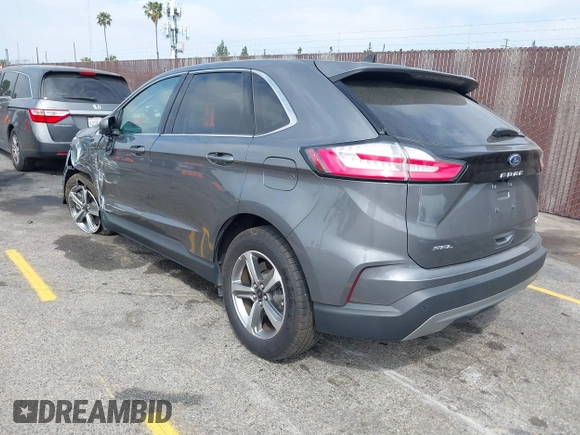 2023 Ford Edge SEL z VIN 2FMPK4J98PBA03830, wystawiony jako IAAI lot #41992054 z przebiegiem 21 081 mil mil oraz . Historia ofert i sprzedaży dostępna na DreamBid. Obrazek 3.