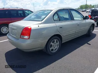2003 Hyundai Elantra GLS z VIN KMHDN45D83U514659, wystawiony jako IAAI lot #42016920 z przebiegiem 125 673 mil mil oraz . Historia ofert i sprzedaży dostępna na DreamBid. Obrazek 4.