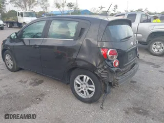 2015 Chevrolet Sonic LT with VIN 1G1JC6SH2F4161722, listed as a IAAI auction lot 41737818 with 123,595 mi miles. Bid and sale history available at carsss.com. Image 3.