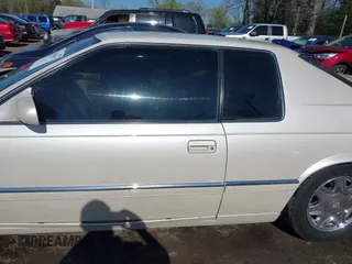 2000 Cadillac Eldorado ESC with VIN 1G6EL12Y0YB702778, listed as a IAAI auction lot 41988107 with 203,526 mi miles. Bid and sale history available at carsss.com. Image 14.
