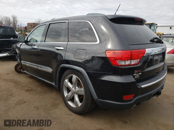 2011 Jeep Grand Cherokee Overland with VIN 1J4RR6GT9BC660730, listed as a Copart auction lot 53770745 with 106,351 mi miles and Salvage title. Bid and sale history available at DreamBid. Image 2.