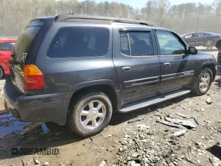 2004 GMC Envoy SLT with VIN 1GKET16S046155005, listed as a Copart auction lot 53554505 with 184,039 mi miles and Salvage Title. Bid and sale history available at DreamBid. Image 3.