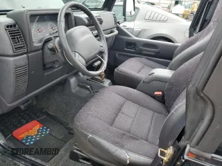 2002 Jeep Wrangler Sport with VIN 1J4FA49S12P730135, listed as a Copart auction lot 54477835 with 148,153 mi miles and Salvage title. Bid and sale history available at DreamBid. Image 7.