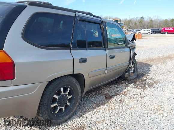 2003 GMC Envoy SLT with VIN 1GKDS13SX32203909, listed as a IAAI auction lot 41457713 with 199,507 mi miles. Bid and sale history available at carsss.com. Image 16.