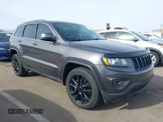 2016 Jeep Grand Cherokee Laredo z VIN 1C4RJEAG9GC386598, wystawiony jako IAAI lot #41909681 z przebiegiem 87 626 mil mil oraz . Historia ofert i sprzedaży dostępna na DreamBid. Obrazek 1.