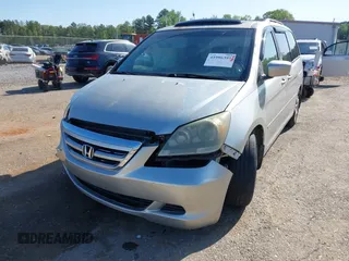 2005 Honda Odyssey EX-L z VIN 5FNRL38715B014905, wystawiony jako IAAI lot #41986395 z przebiegiem 191 029 mil mil oraz . Historia ofert i sprzedaży dostępna na DreamBid. Obrazek 17.